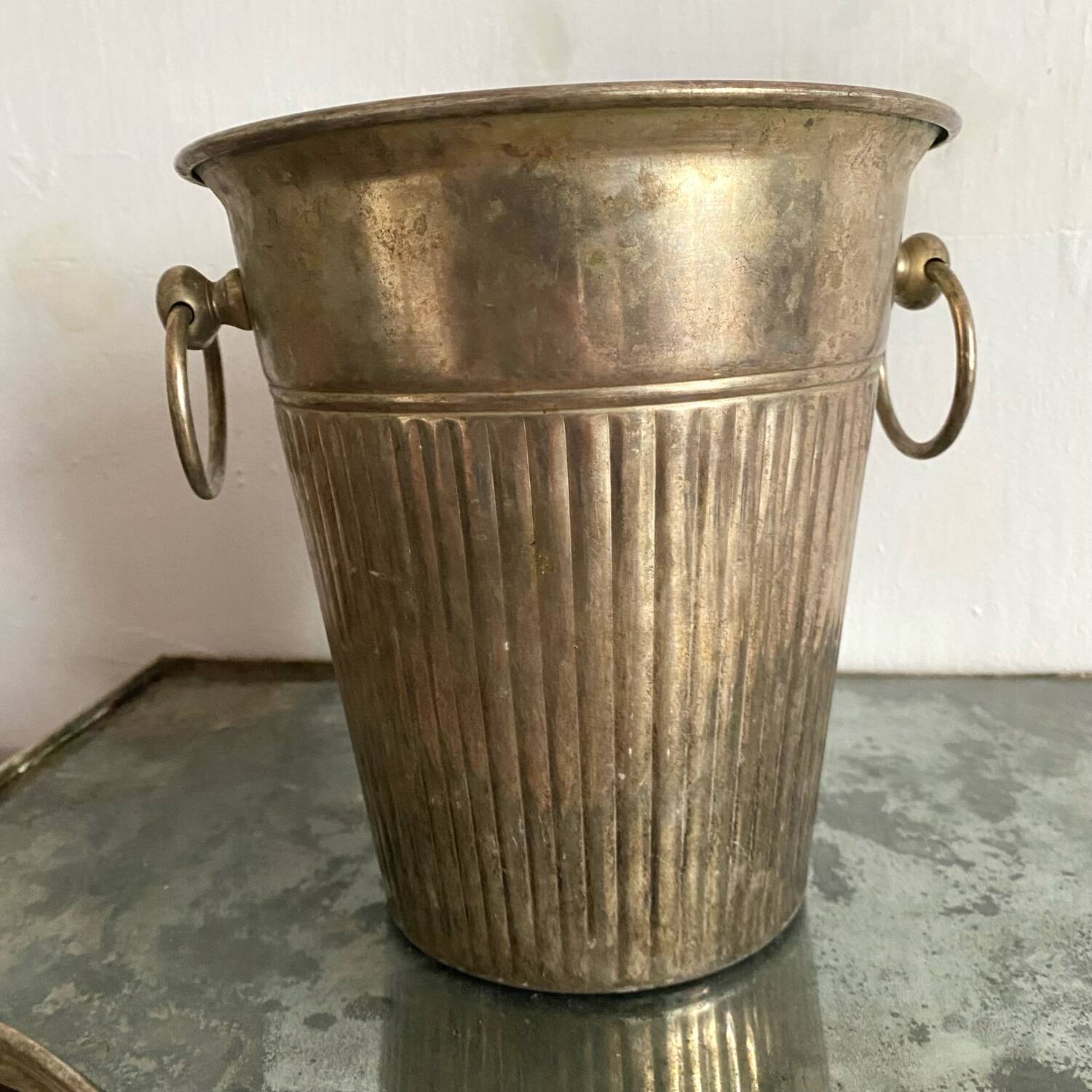 Patinated silver metal champagne bucket