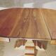 Round table with solid wood central leg entirely restored