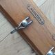 Tea towel holder, wooden and metal towel hook.