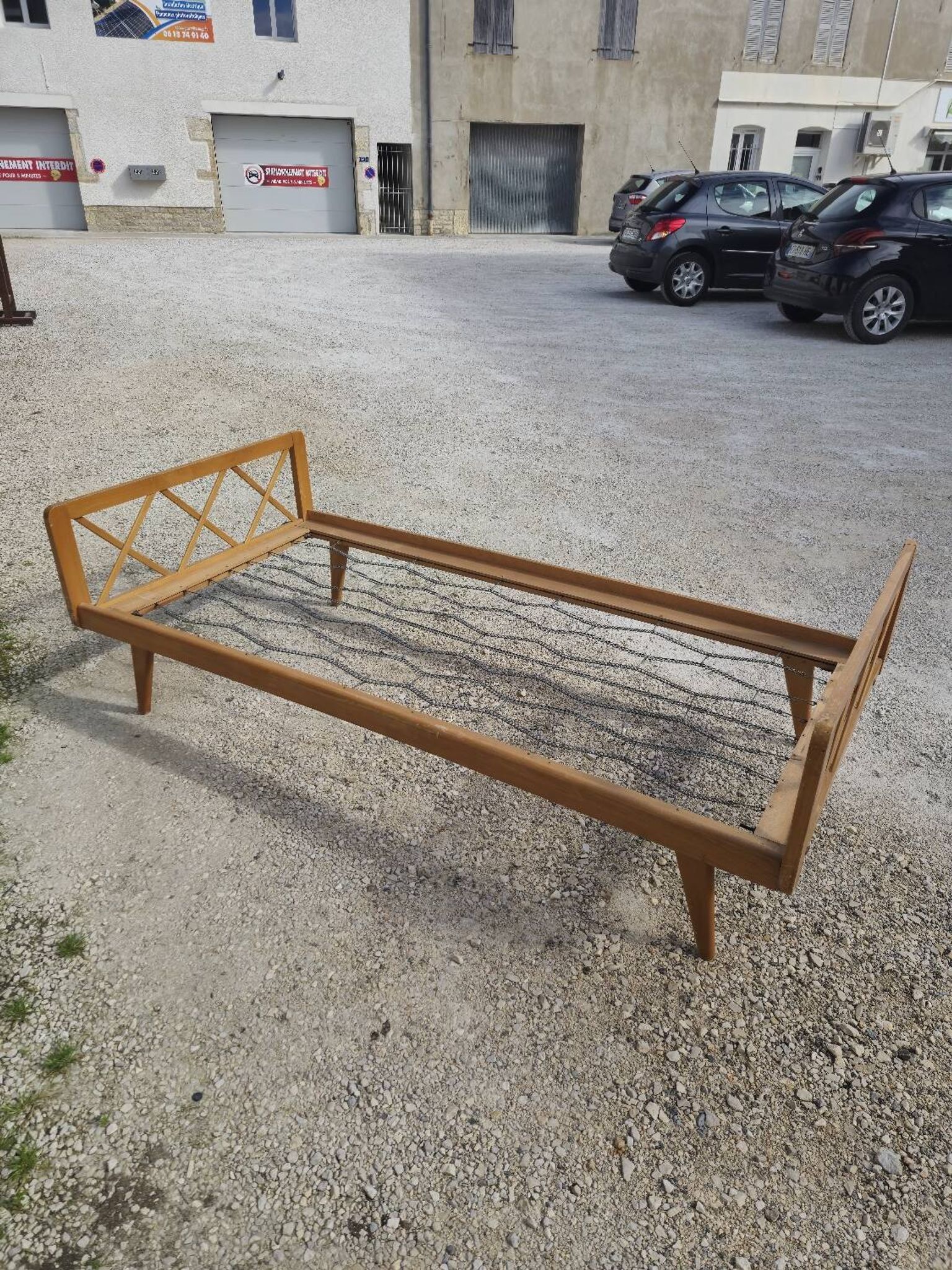 Vintage bed with compass feet from the 1950s