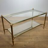 Rare bronze, brass, and steel mesh coffee table with a double glass top resting on a brass mesh. French work by Jansen