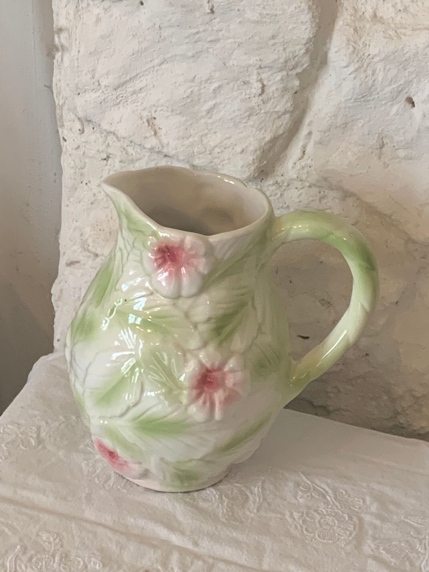 Ceramic dabbling jug enamelled floral motif