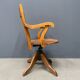 Antique American oak office chair with armrests 1920s