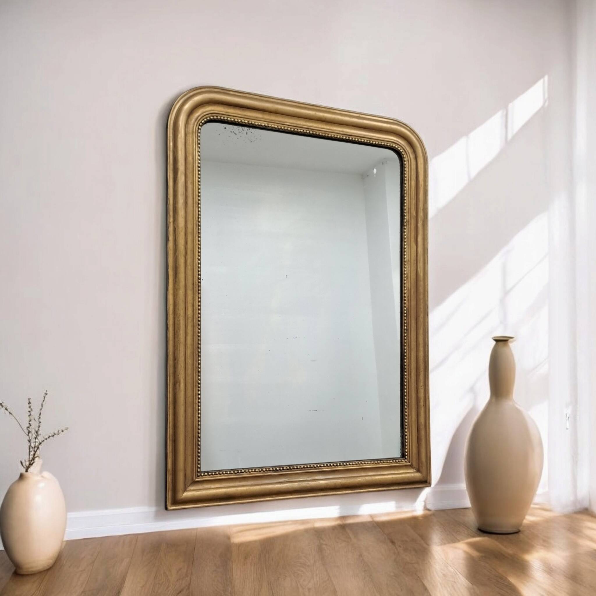 Large antique Louis Philippe gilded mirror