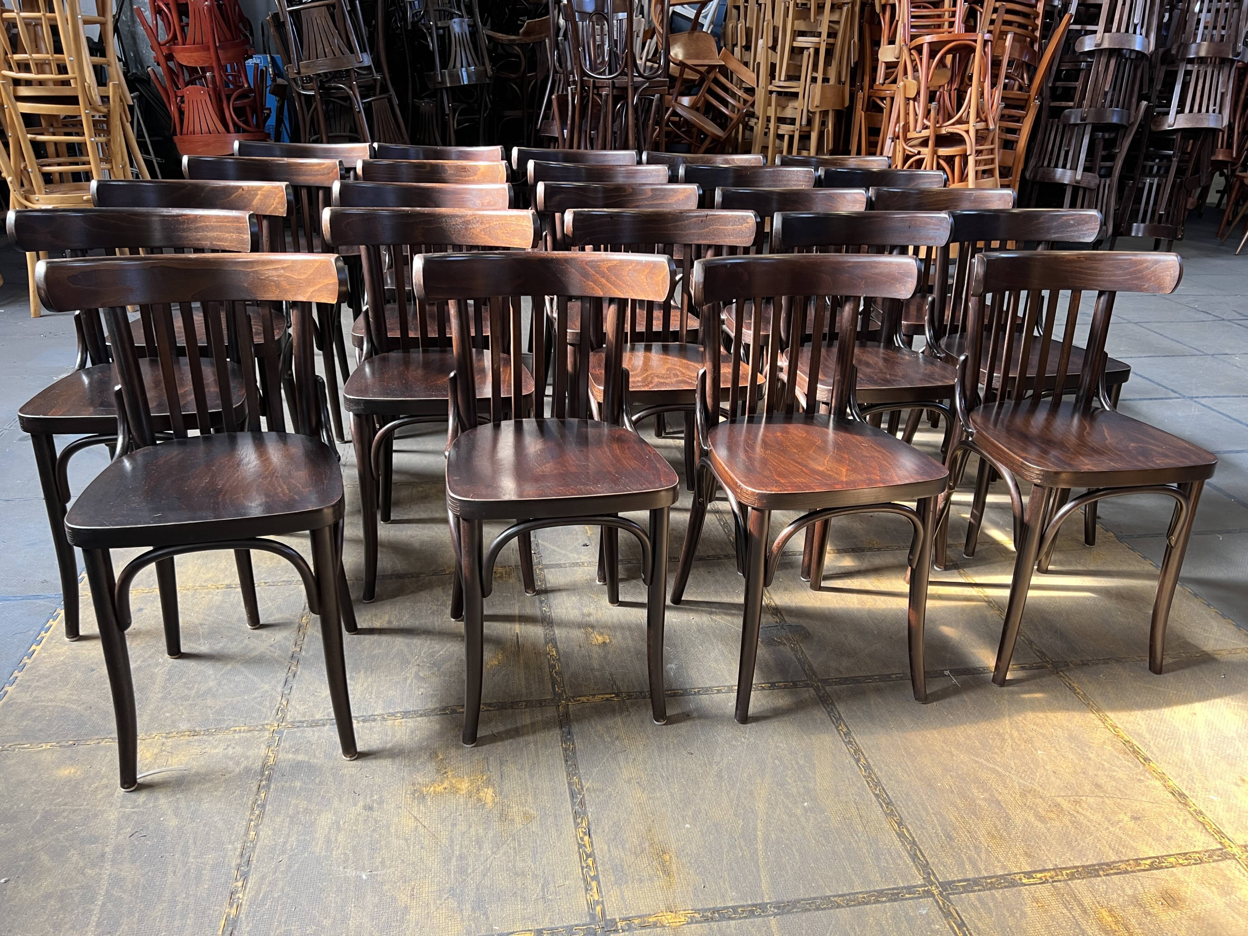 Set of 24 restored bistro chairs.