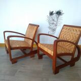 Pair of Art Deco woven rattan armchairs and table