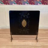 Antique metal fireplace screen.