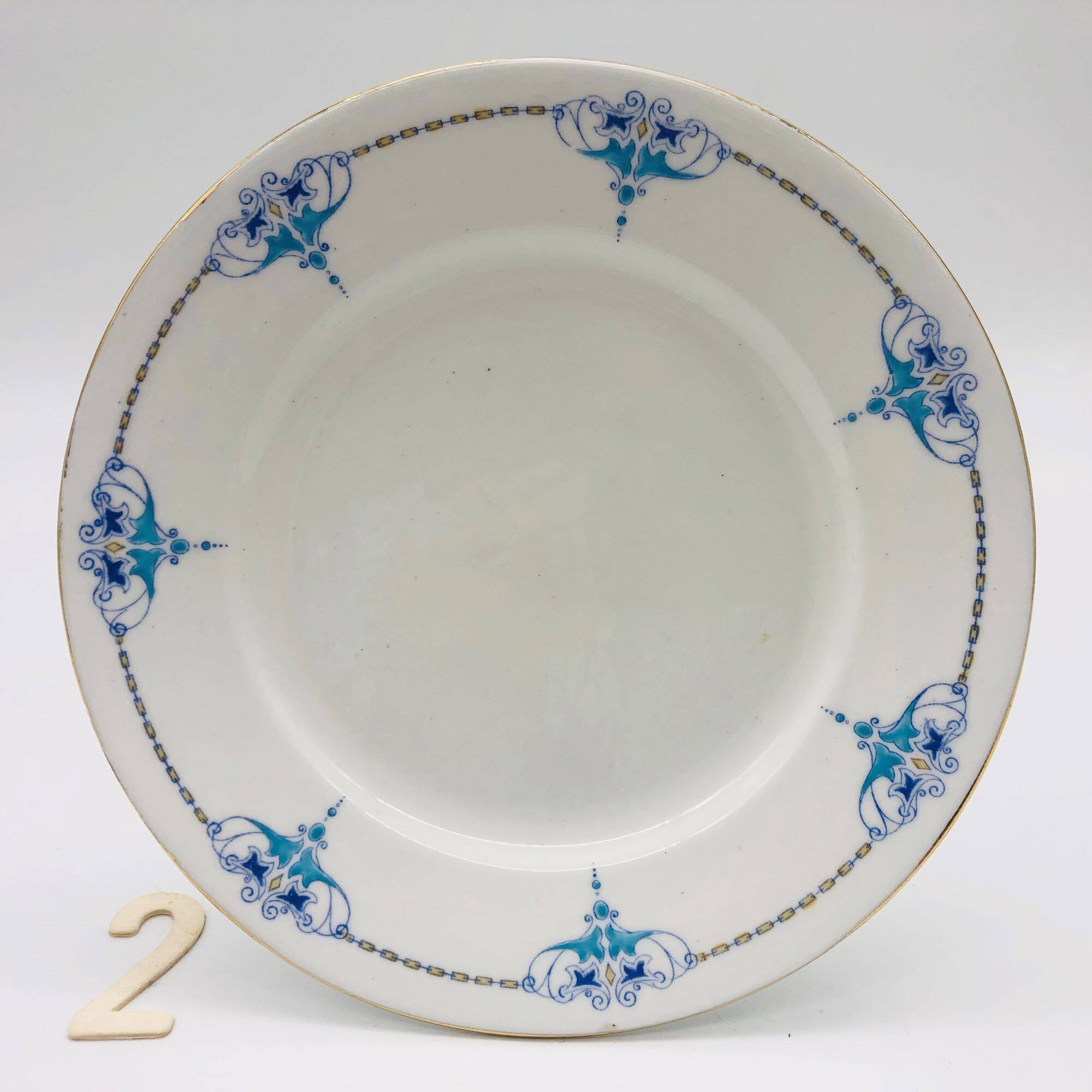 6 Dessert plates and a “Shelley - England” serving dish