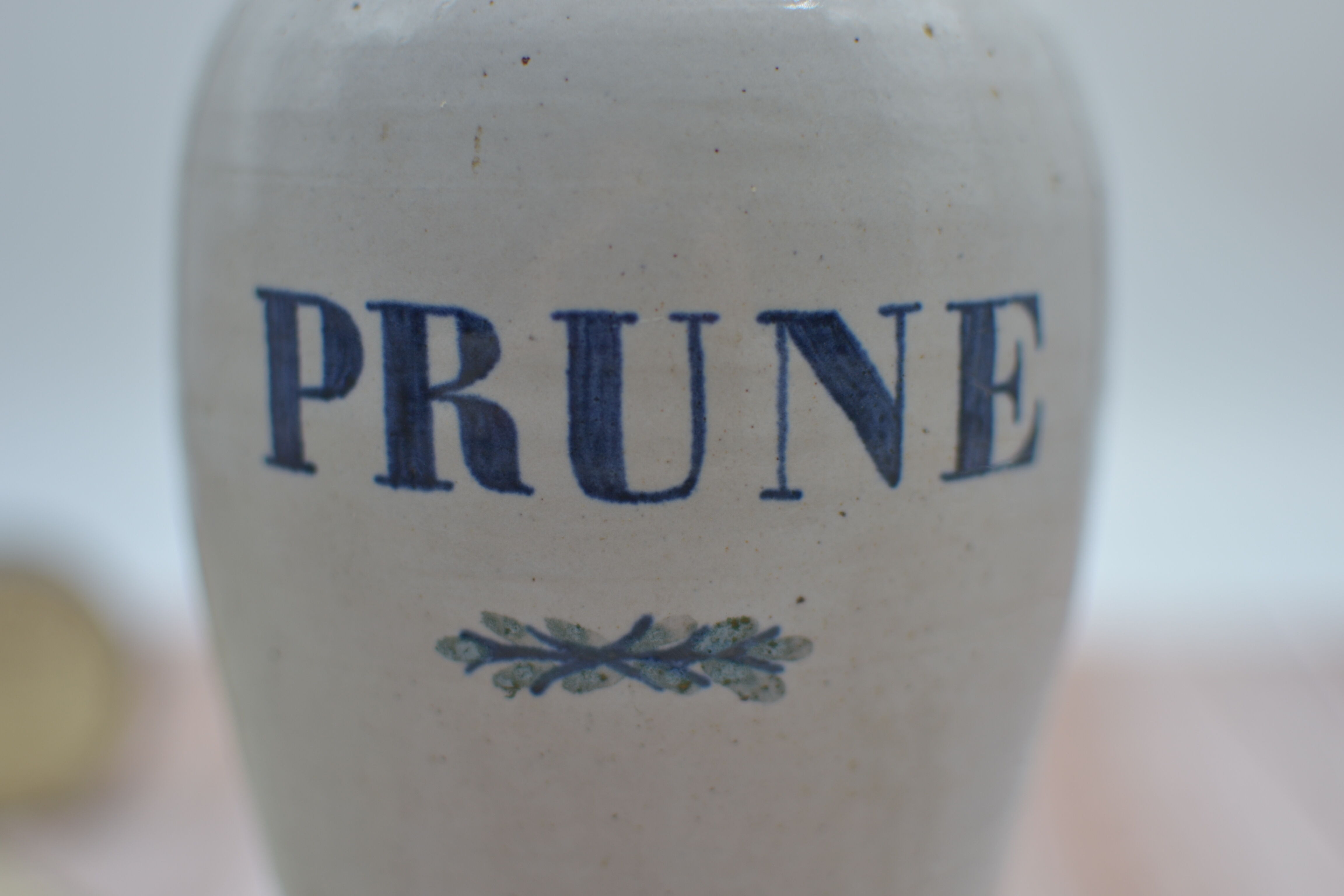 Vintage plum stoneware bottle