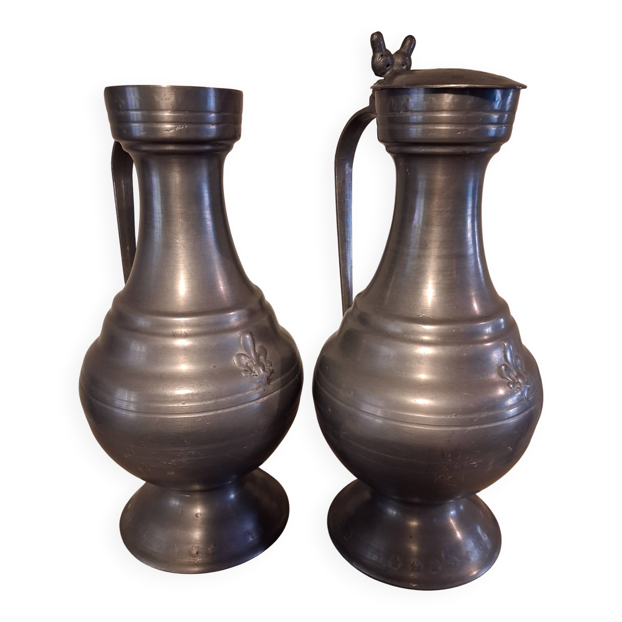 Large vintage pewter jugs