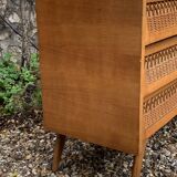 Rattan wardrobe and its compass-legged chest of drawers, 1960