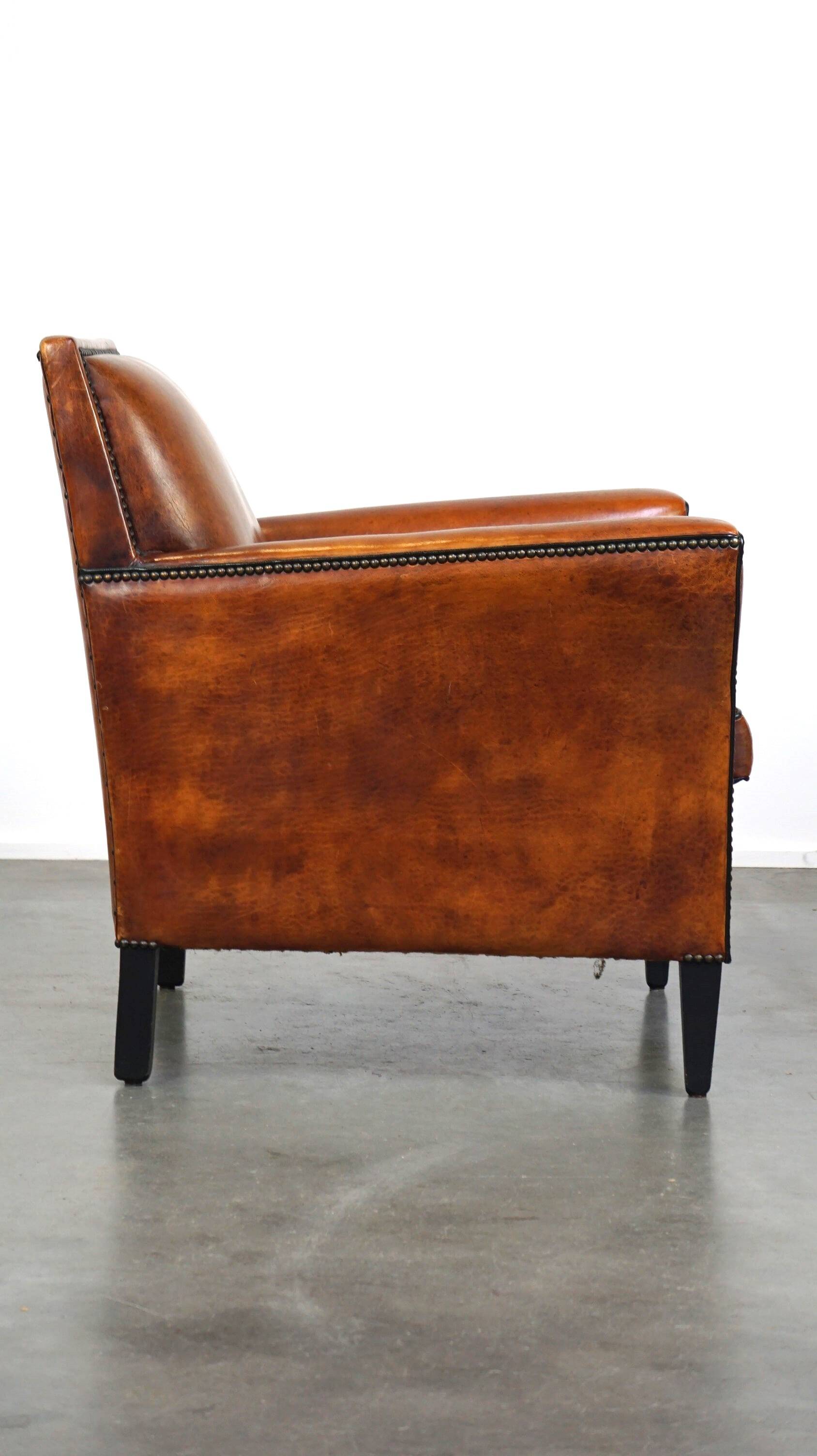 Sleek sheepskin Art Deco design armchair with beautiful details