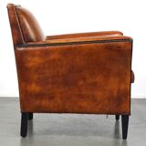 Sleek sheepskin Art Deco design armchair with beautiful details