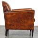 Sleek sheepskin Art Deco design armchair with beautiful details