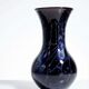 Large vintage purple art glass vase with silver glitter inclusions.