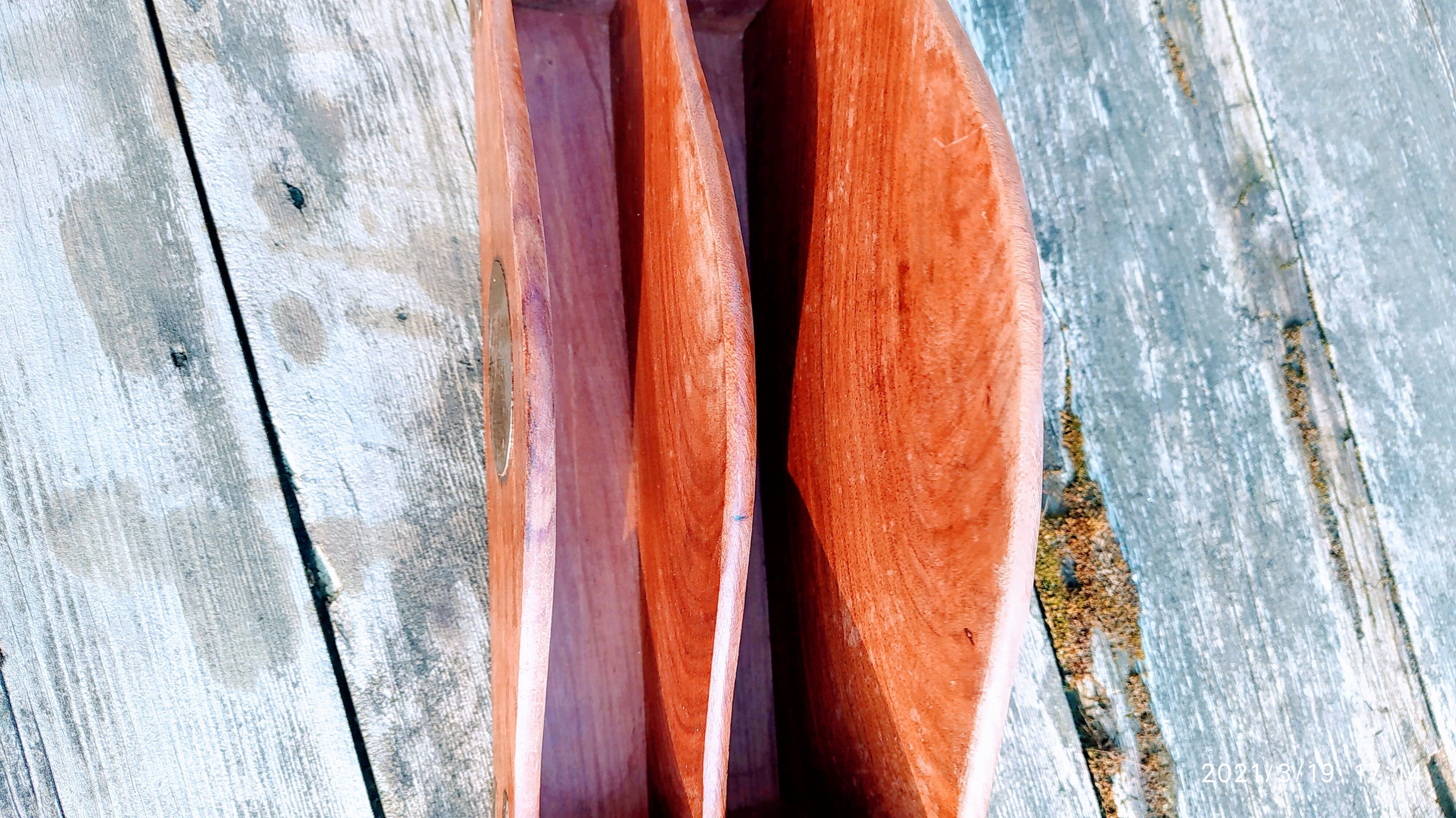 Old exotic wooden and copper mail door