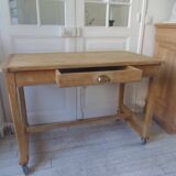 Vintage kitchen table on casters.