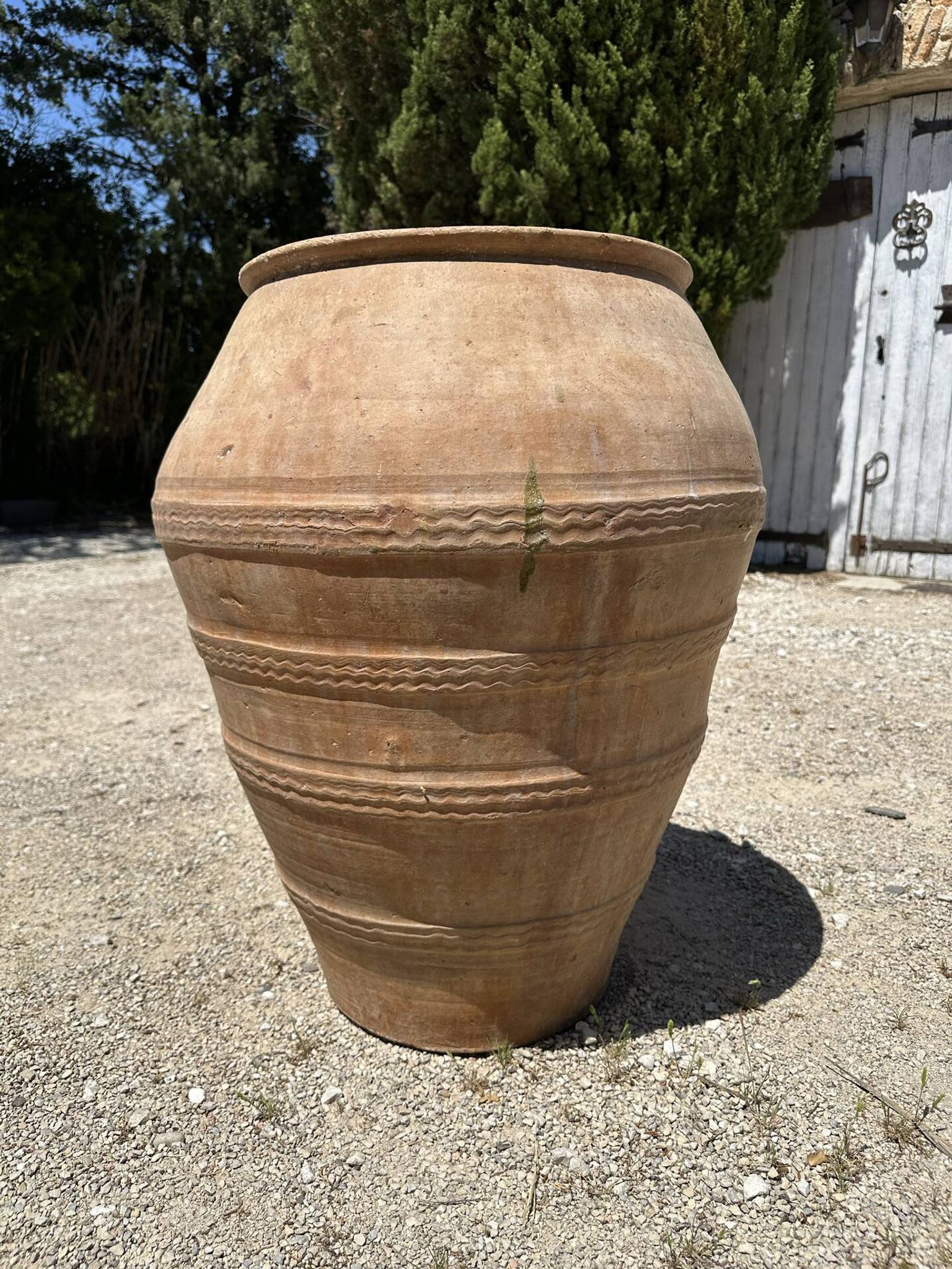 Ancient terracotta pottery jar