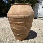 Ancient terracotta pottery jar
