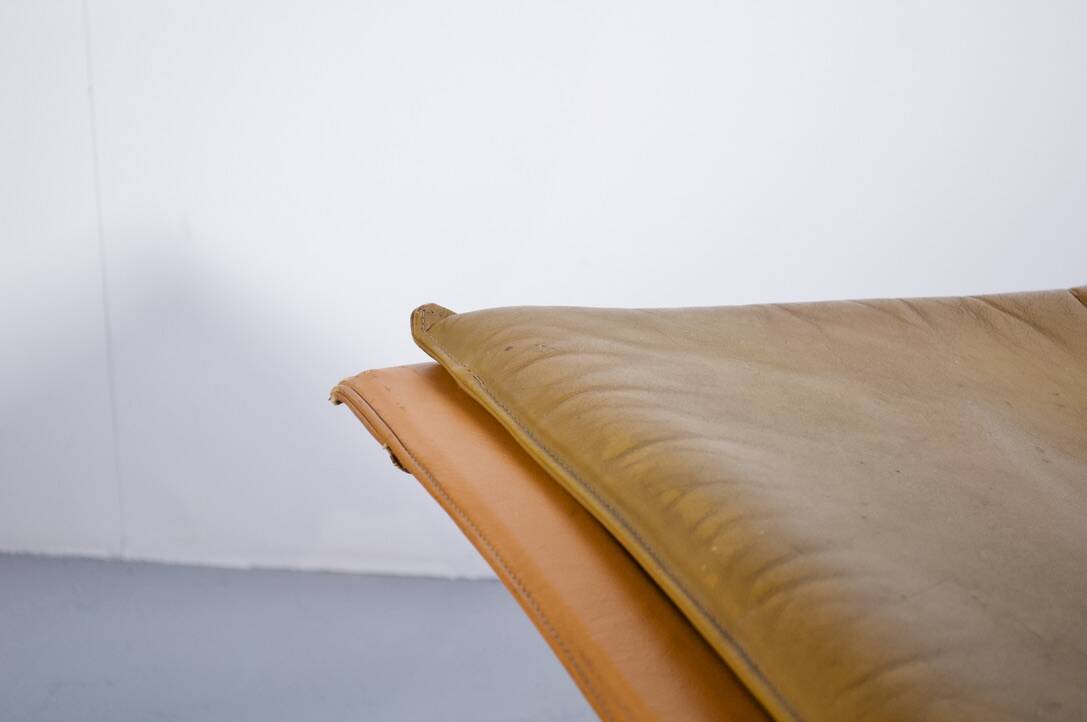 Imposing pair of leather and steel armchairs from the 1960s
