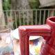 Burgundy/red ceramic pitcher