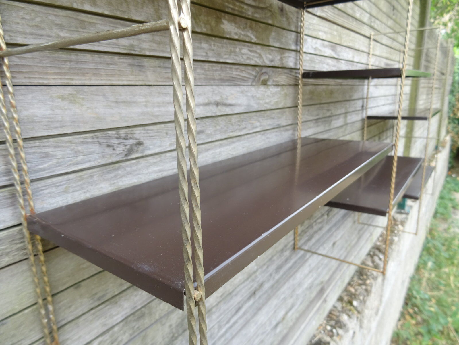 Modular metal string wall shelf