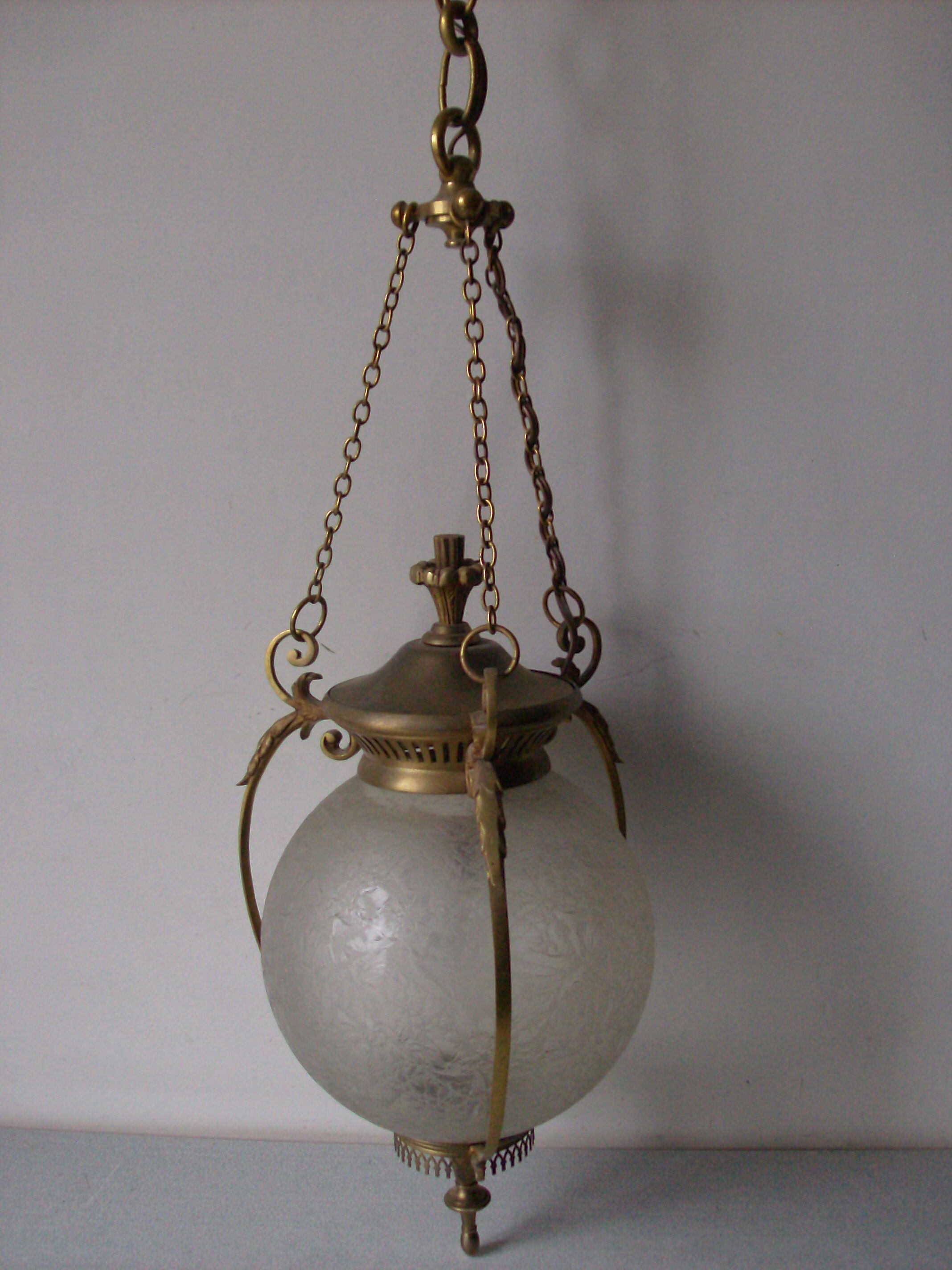 Suspension in bronze and engraved glass