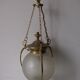 Suspension in bronze and engraved glass