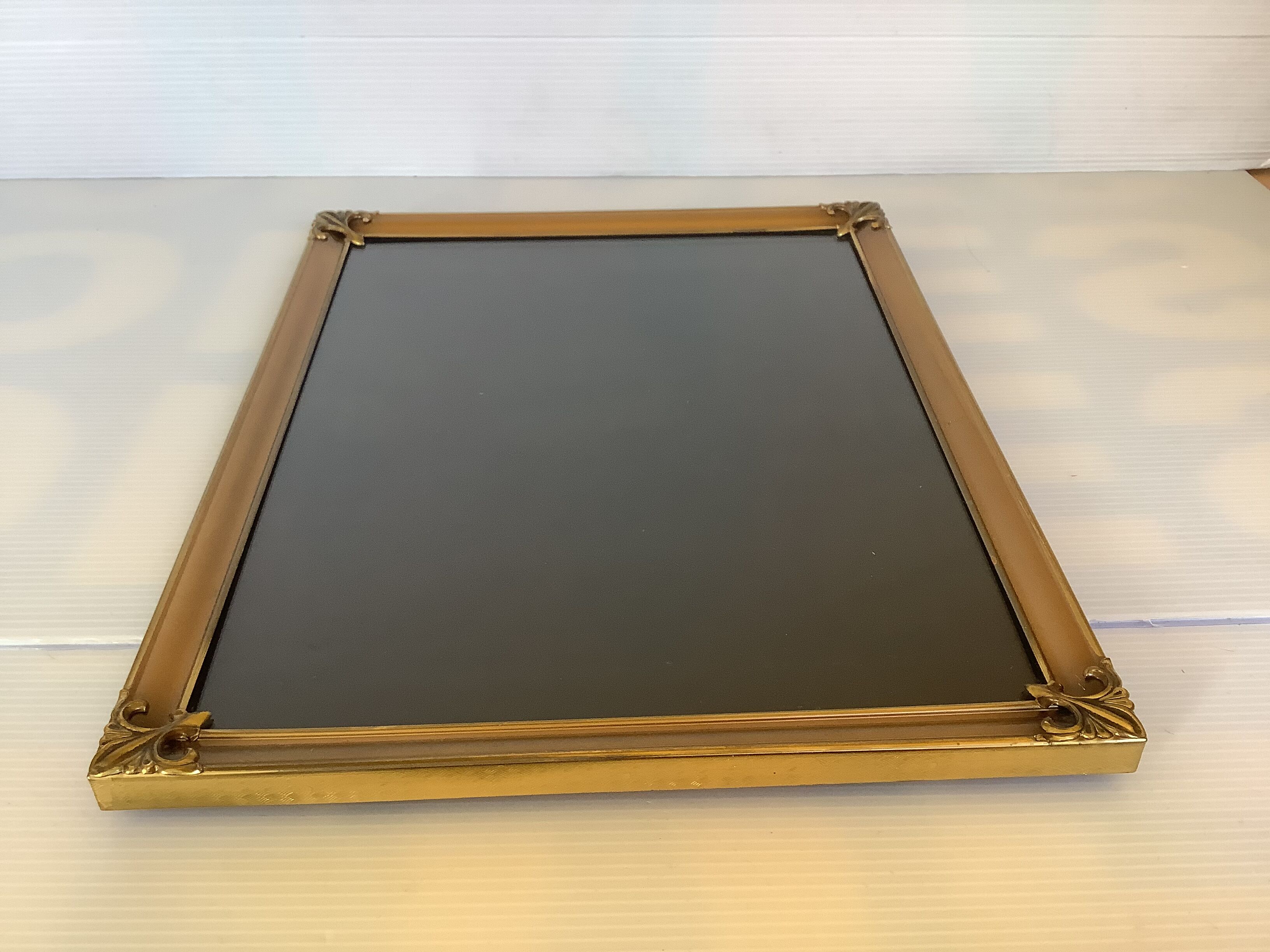 Old fleur-de-lys metal frame
