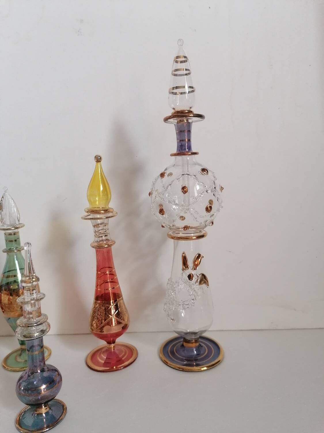 6 Egyptian gold and mouth-blown perfume bottles