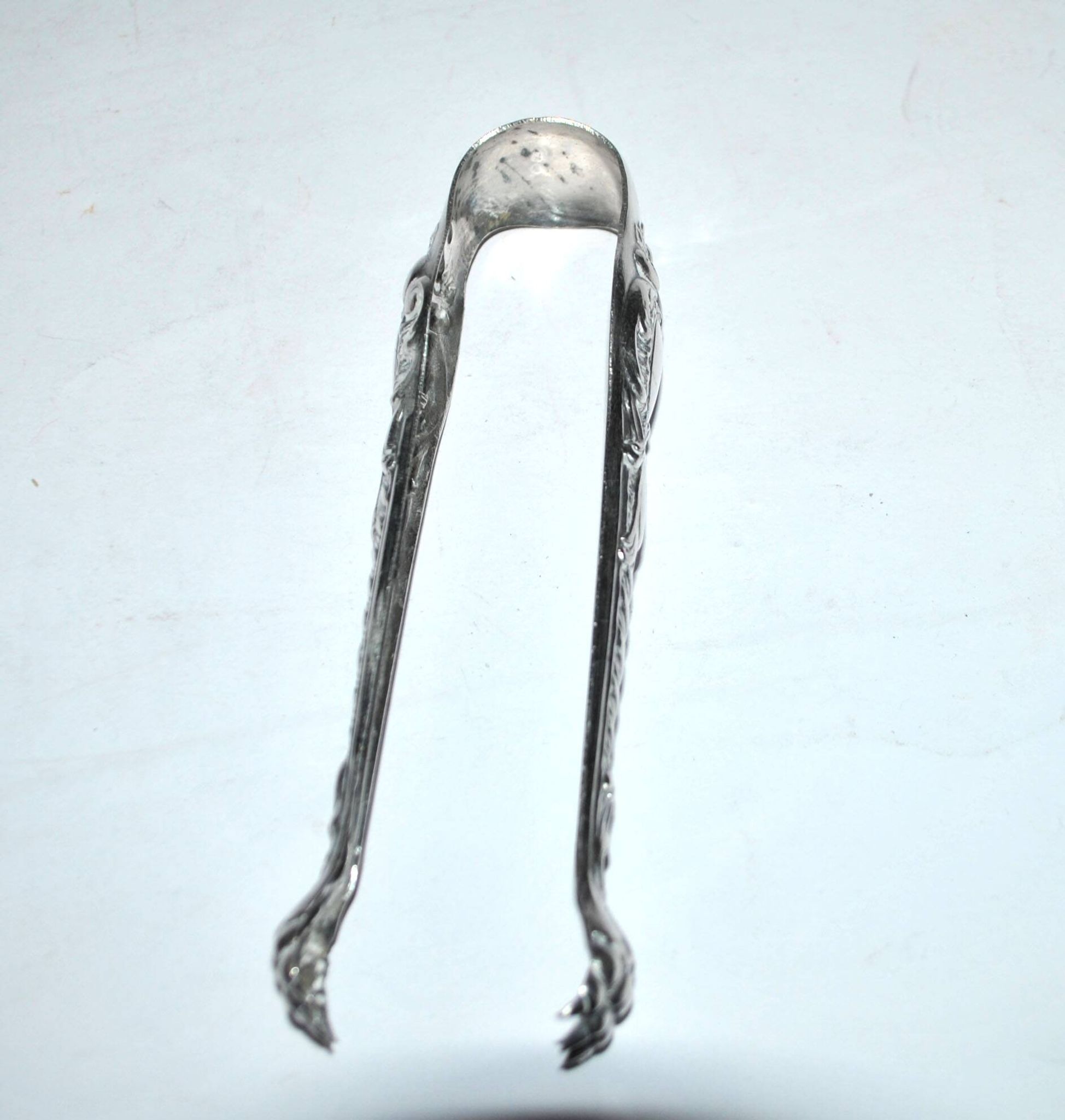 Pince à sucre Rocaille en métal argenté