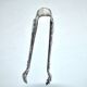 Rocaille sugar tongs in silver metal with lion claw medallion