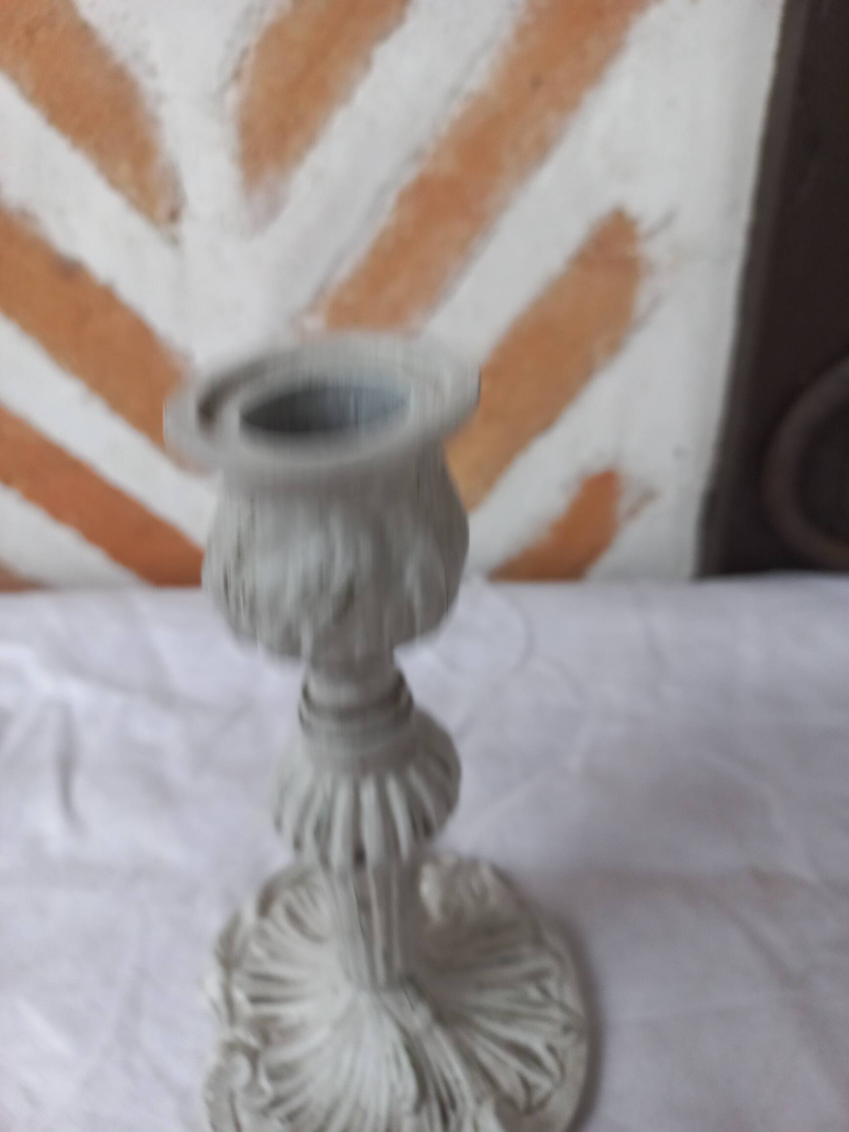 Candlestick holder patinated white gray