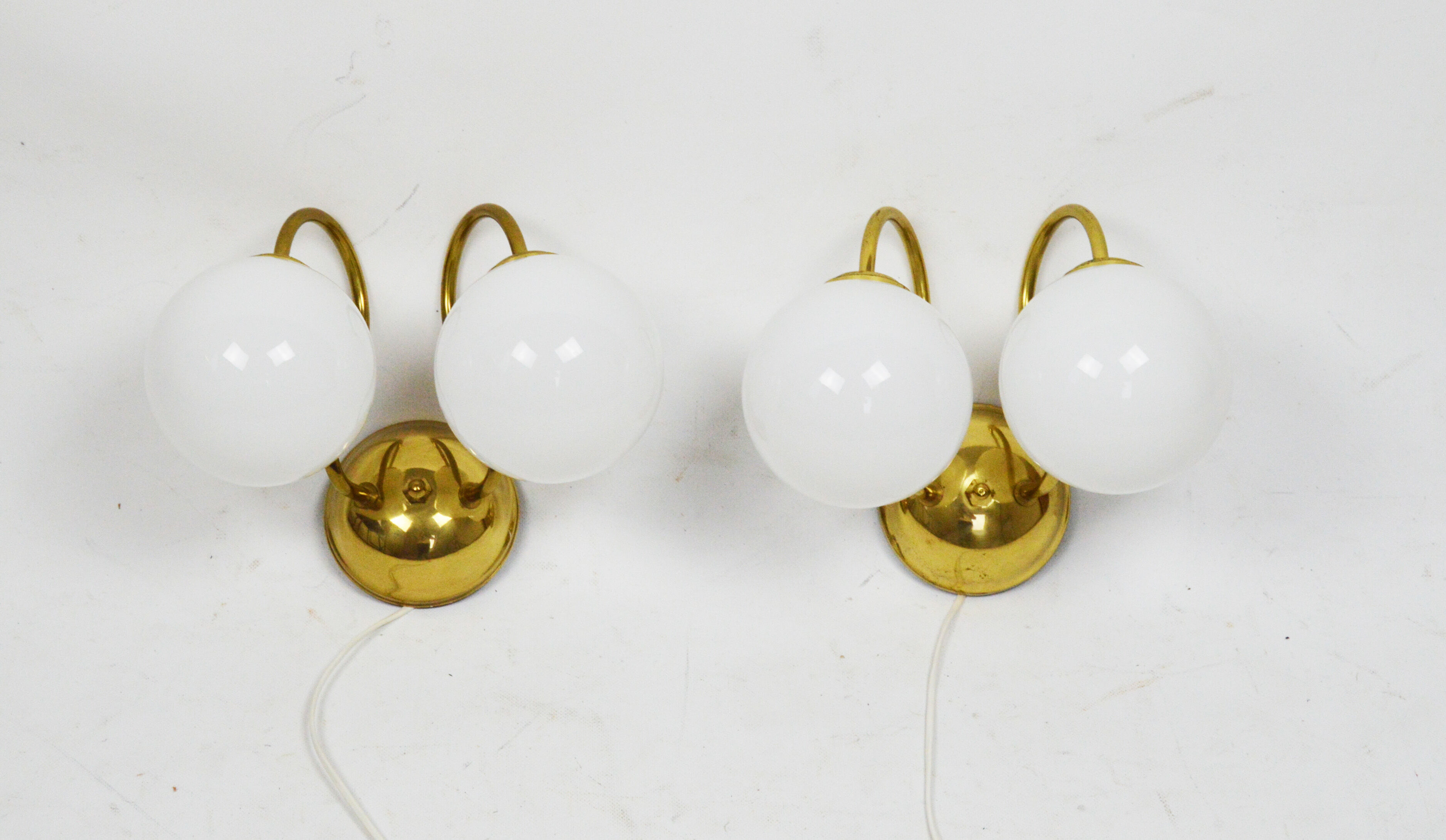 A pair of wall lamps, Poland, 1980s