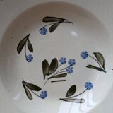 Old deep iron earth plate with blue flower pattern
