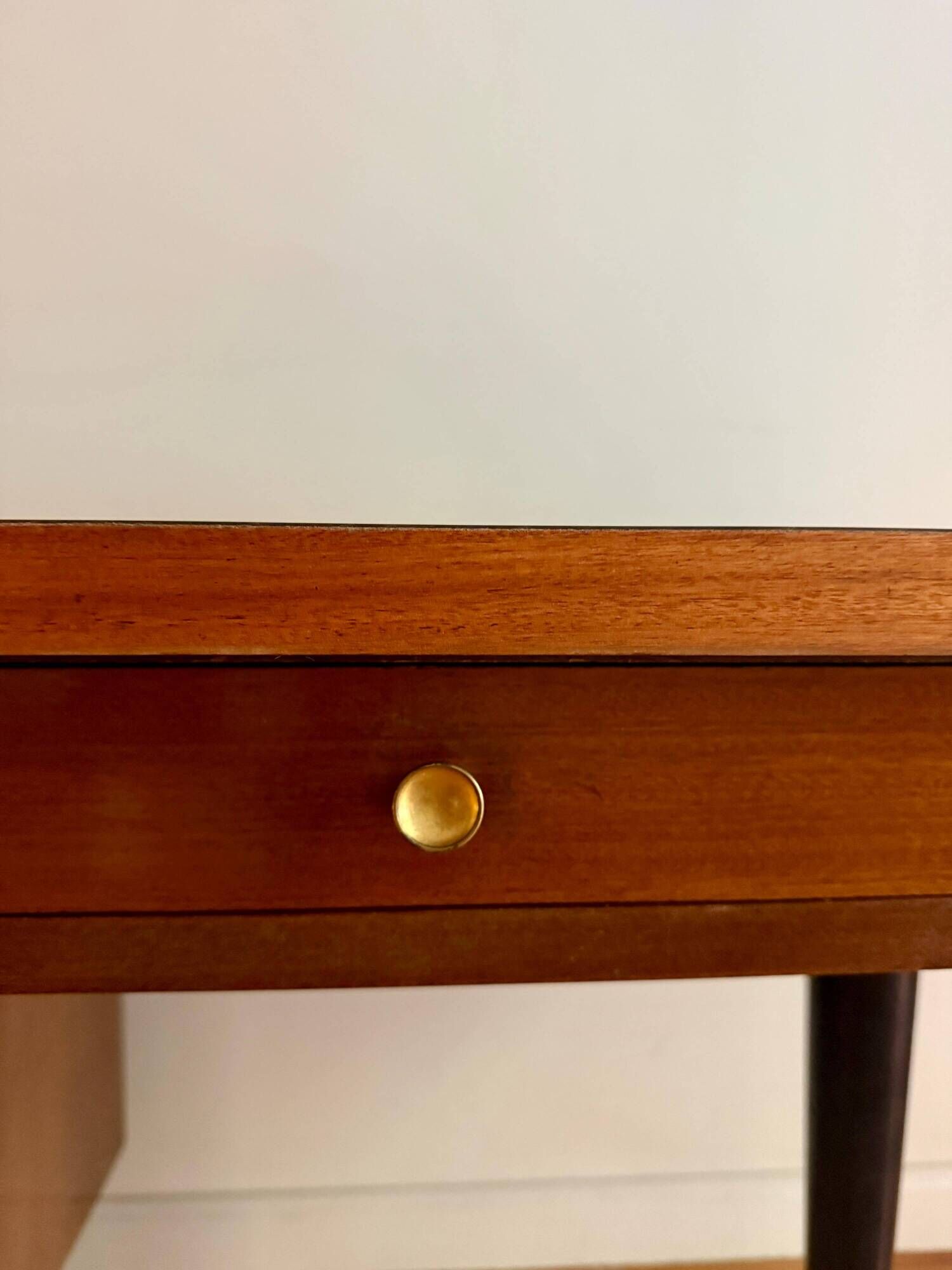 French desk "Prouve" in walnut, bronze and rubber from the 1970s.