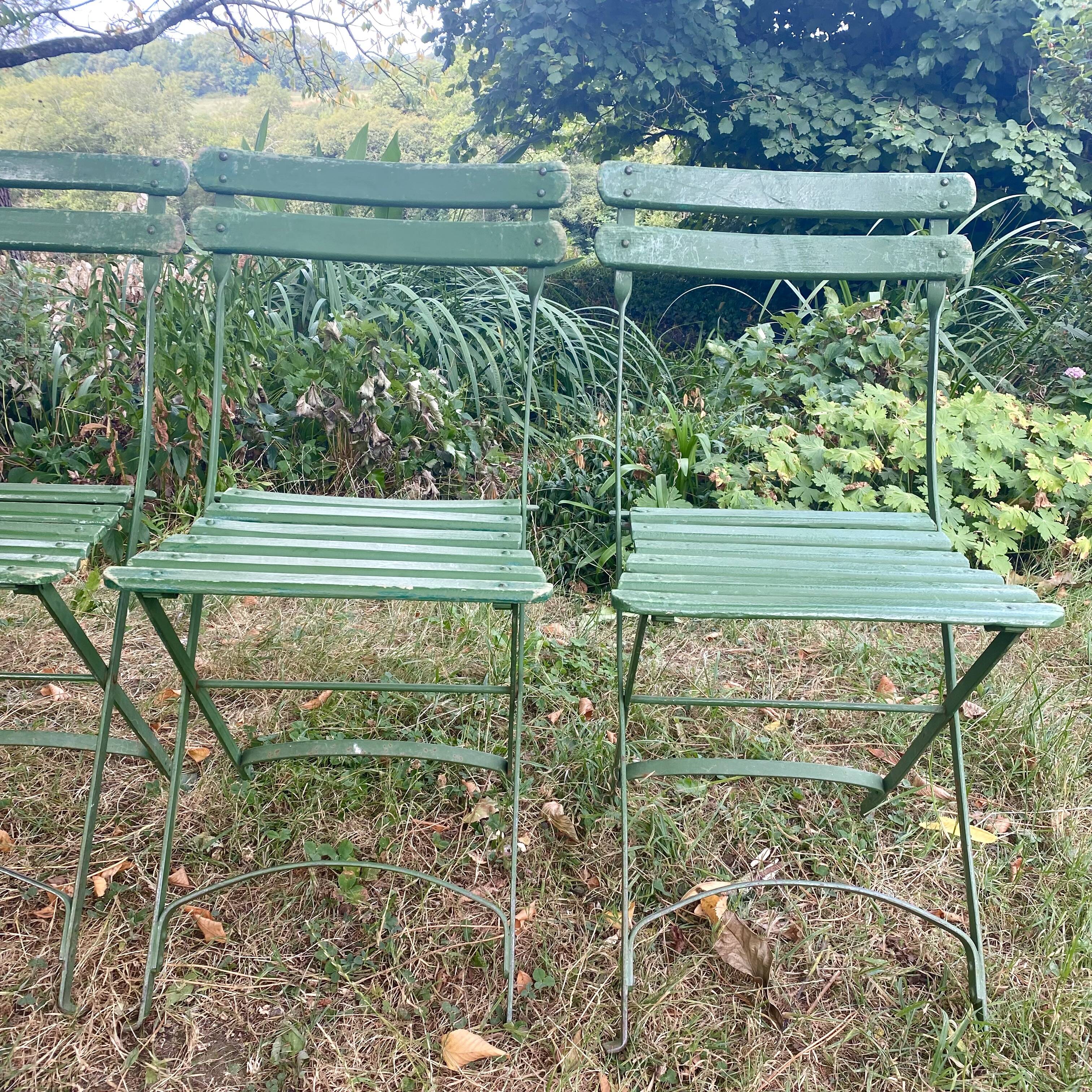 Antique folding garden chairs with wooden slats