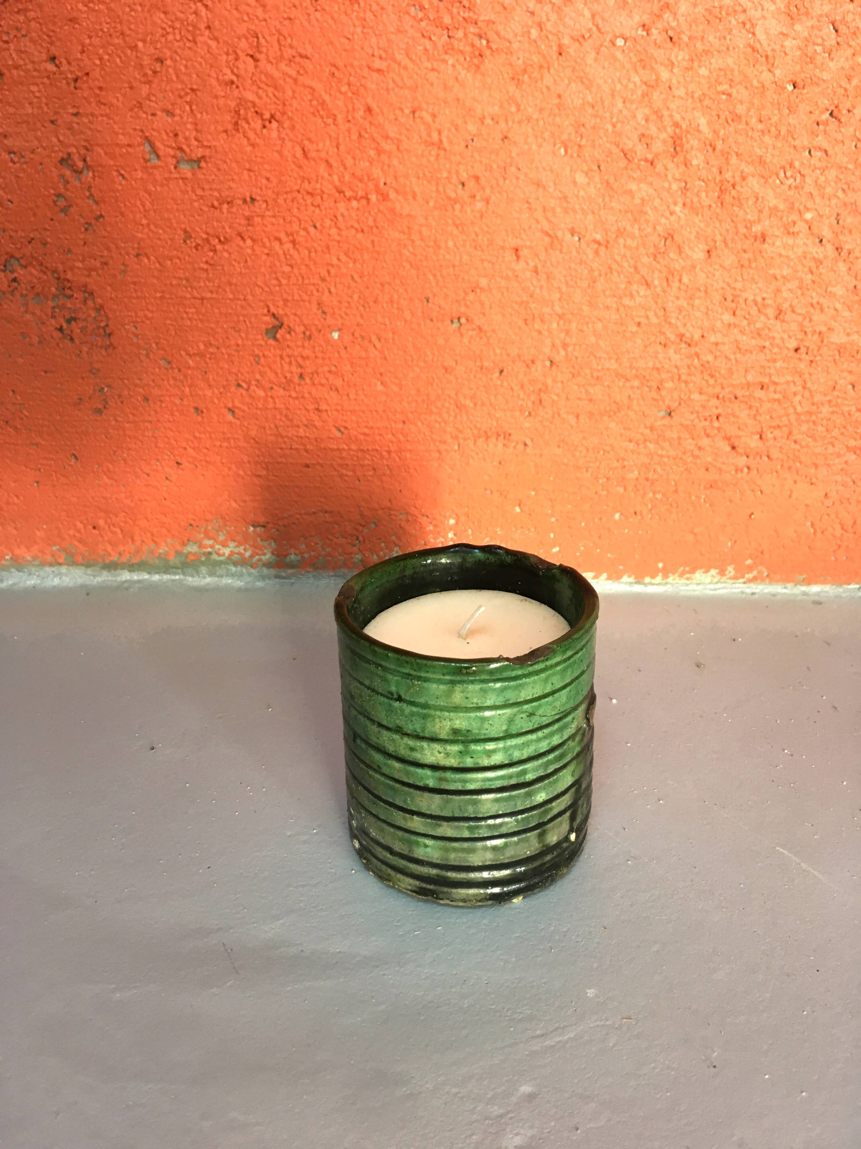 Candle placed in terracotta pottery