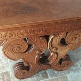Rocaille table in carved solid oak