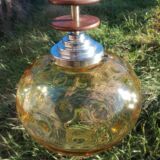 Vintage suspension ball in amber glass