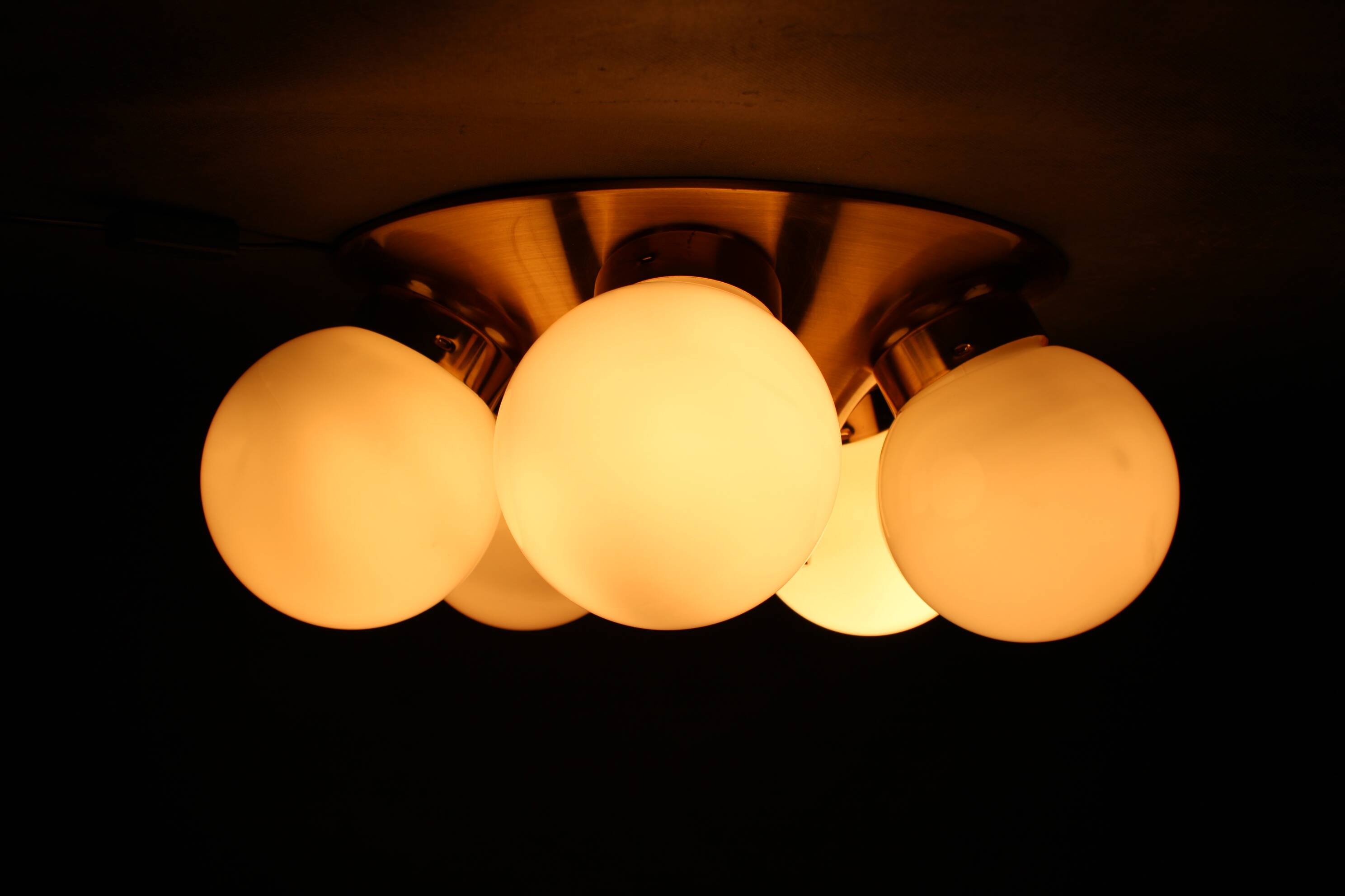 Pair of mid-century brass flush mount lights, 1970s