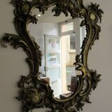 Louis XV style mirror, with bronze frame.