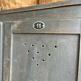 Old wooden locker with black patina