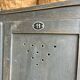 Old wooden locker with black patina