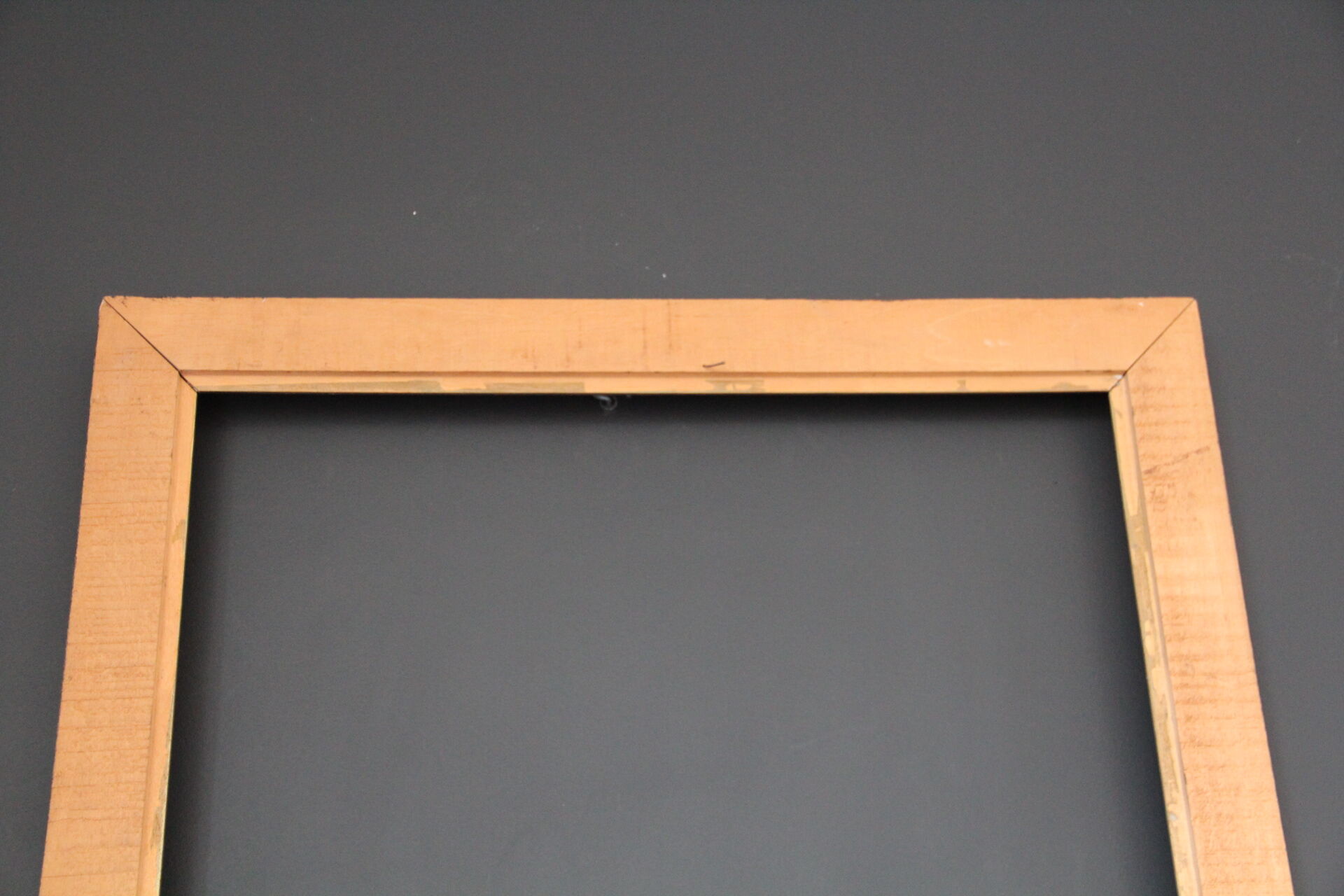 Large wooden black and gilded frame