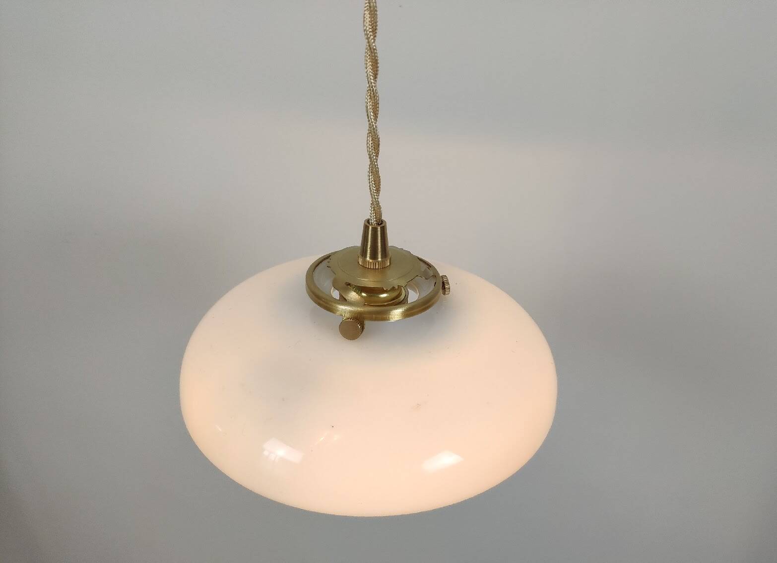 Vintage suspension in white opaline with a bulged shape – 1960s lampshade, brass.