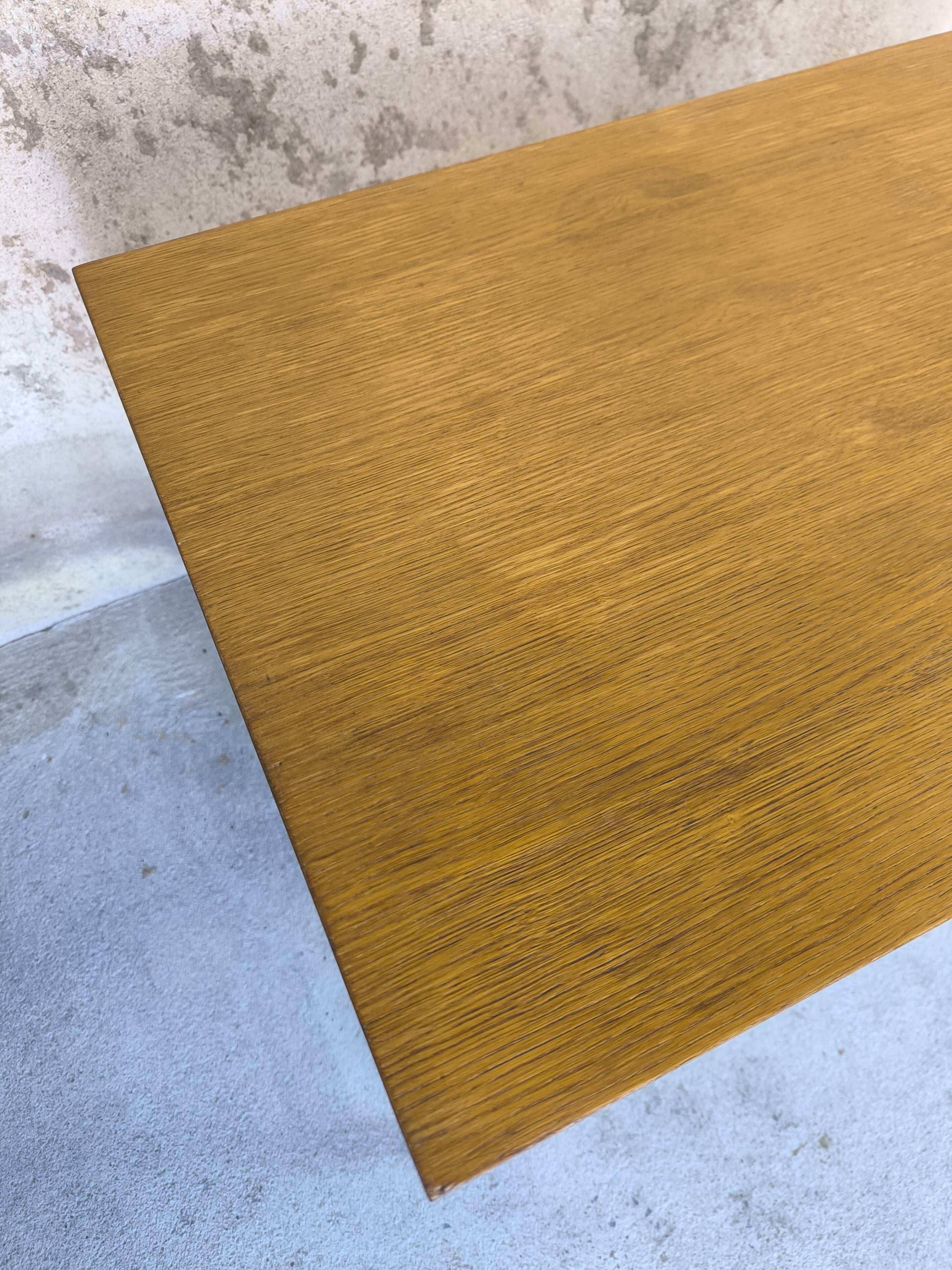 Vintage desk in modernist style made of wood.
