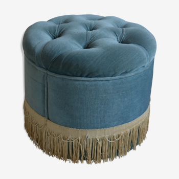 Pouf en velours capitonné