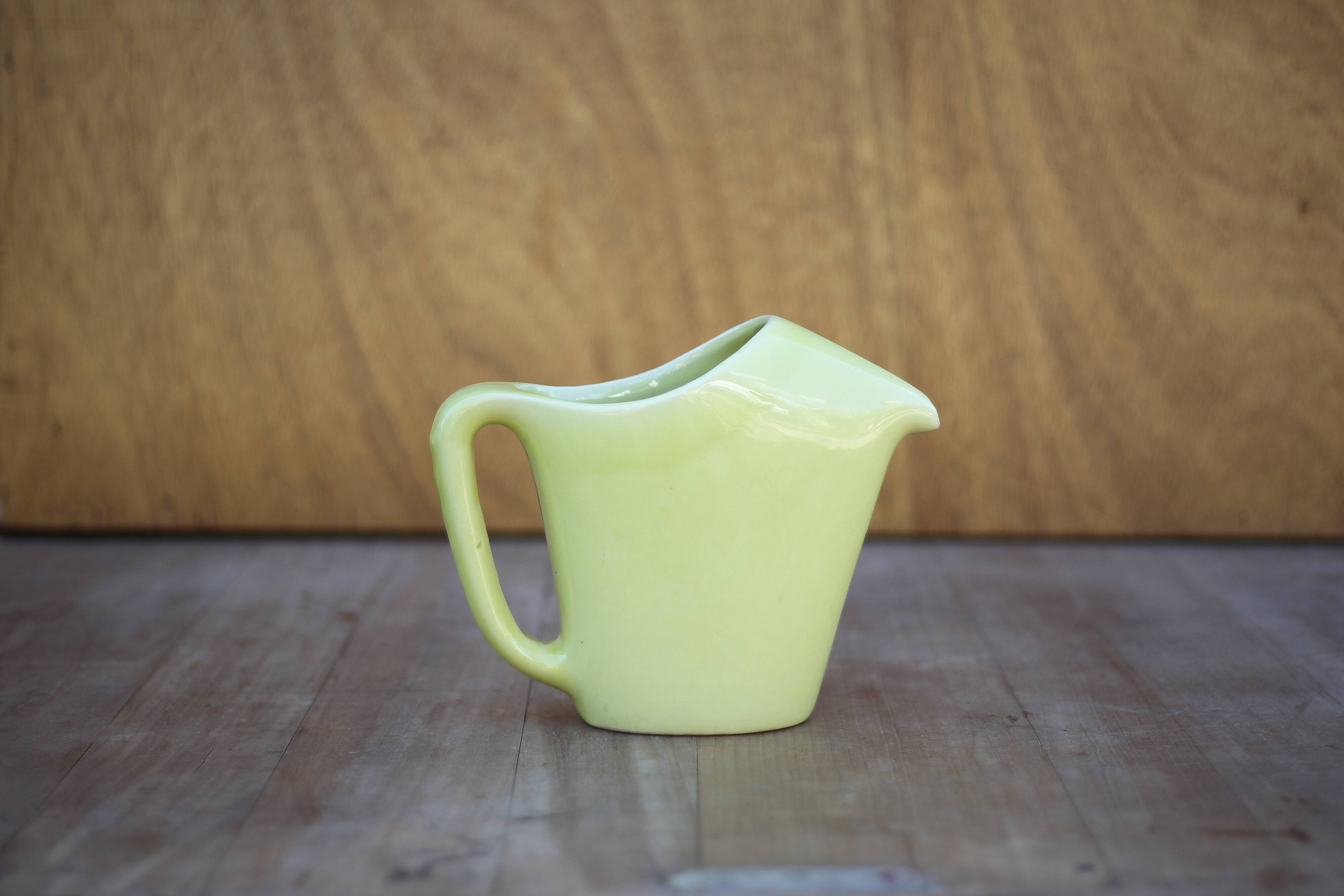 Saint Clement pitcher, modernist pitcher, yellow ceramic pitcher