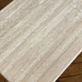 Minimalist design coffee table in unbleached travertine stone